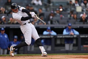 Apr 19, 2026; Bronx, New York, USA; New York Yankees right fielder Aaron Judge (99) hits a two run home run during the first inning against the Kansas City Royals at Yankee Stadium. Mandatory Credit: Vincent Carchietta-Imagn Images