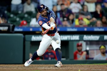Apr 19, 2026; Houston, Texas, USA; Houston Astros second baseman Jose Altuve (27) hits an RBI infield single against the St. Louis Cardinals during the 10th inning at Daikin Park. Mandatory Credit: Erik Williams-Imagn Images