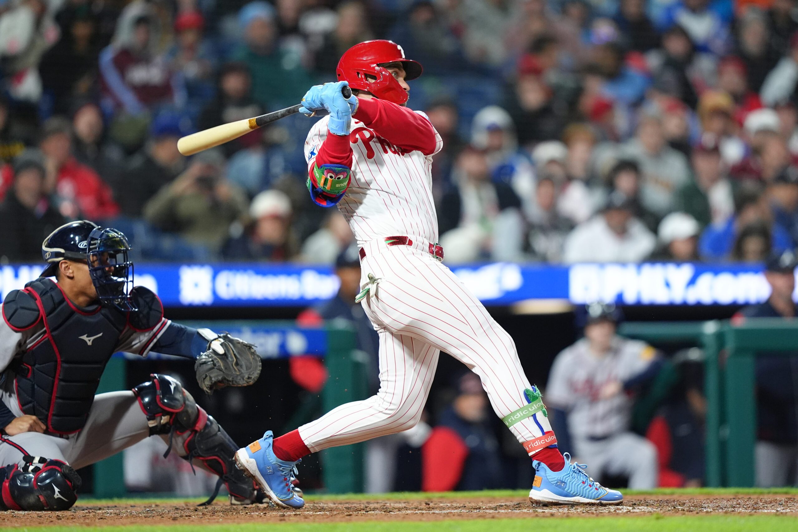 Apr 19, 2026; Philadelphia, Pennsylvania, USA; Philadelphia Phillies infielder Bryce Harper (3) hits a single against the Atlanta Braves in the third inning at Citizens Bank Park. Mandatory Credit: Kyle Ross-Imagn Images