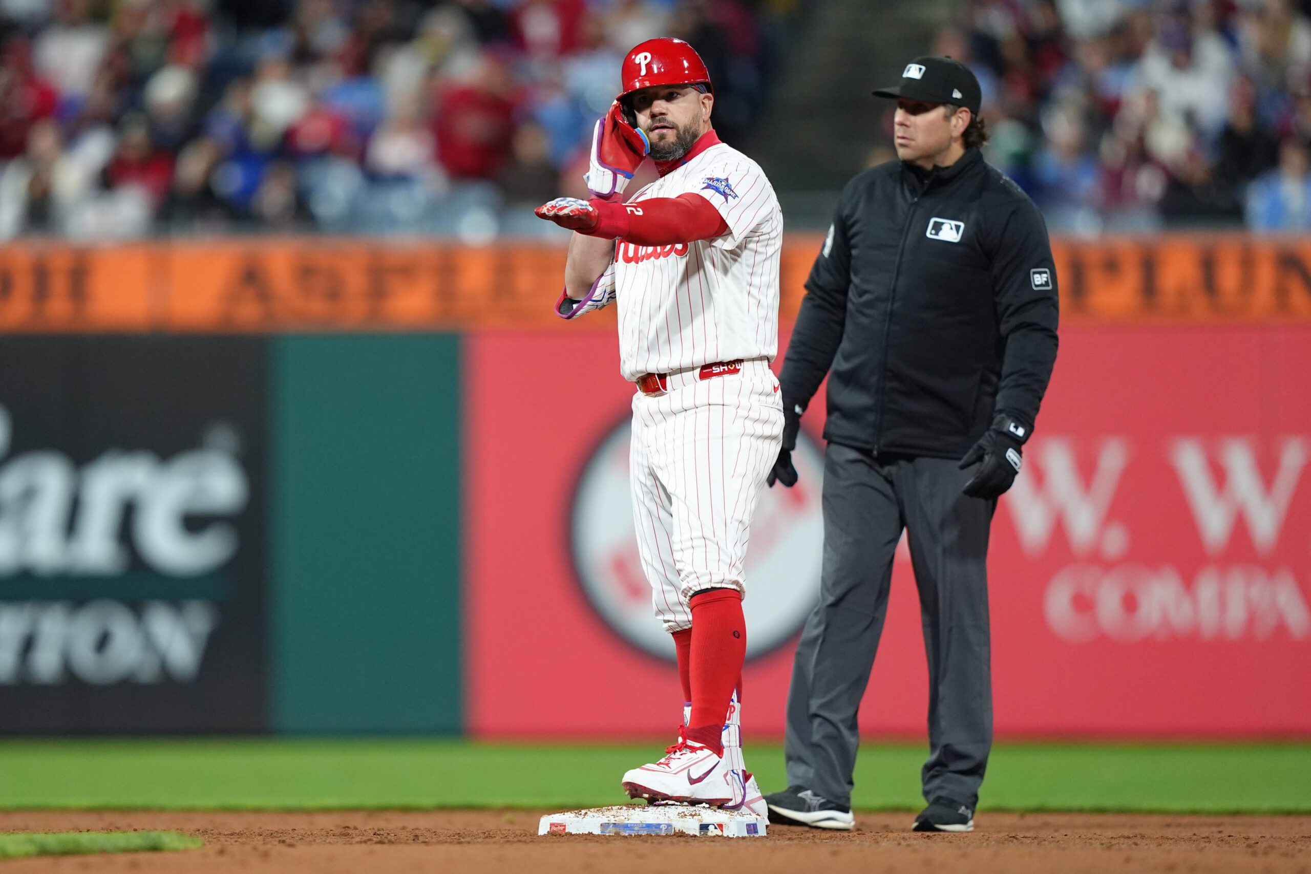 Apr 19, 2026; Philadelphia, Pennsylvania, USA; Philadelphia Phillies designated hitter Kyle Schwarber (12) reacts after hitting a double against the Atlanta Braves in the fifth inning at Citizens Bank Park. Mandatory Credit: Kyle Ross-Imagn Images