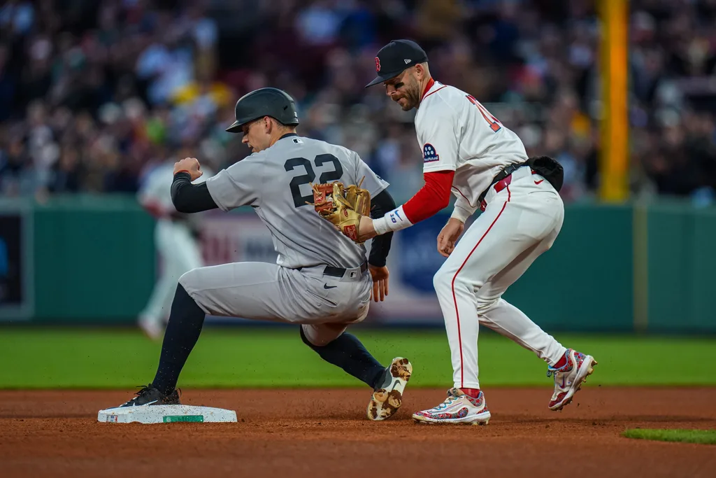 Apr 21, 2026; Boston, Massachusetts, USA; New York Yankees first baseman Ben Rice (22) out at second base by Boston Red Sox shortstop Trevor Story (10) in the fourth inning at Fenway Park. Mandatory Credit: David Butler II-Imagn Images
