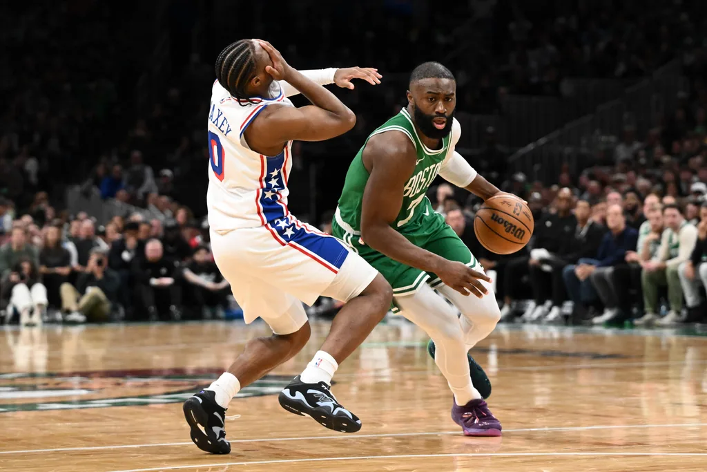 Apr 21, 2026; Boston, Massachusetts, USA; Boston Celtics guard Jaylen Brown (7) fouls Philadelphia 76ers guard Tyrese Maxey (0) in the second half of a game two of the first round of the 2026 NBA Playoffs at TD Garden. Mandatory Credit: Brian Fluharty-Imagn Images