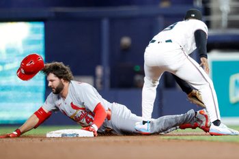 Apr 21, 2026; Miami, Florida, USA;  St. Louis Cardinals first baseman Alec Burleson (41) slides into second base against the Miami Marlins during the first inning at loanDepot Park. Mandatory Credit: Rhona Wise-Imagn Images