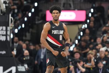 Apr 21, 2026; San Antonio, Texas, USA; Portland Trail Blazers guard Scoot Henderson (0) reacts after scoring a three point basket during the second half of game two of the first round of the 2026 NBA Playoffs against the San Antonio Spurs at Frost Bank Center. Mandatory Credit: Scott Wachter-Imagn Images