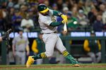 Apr 21, 2026; Seattle, Washington, USA; Athletics catcher Shea Langeliers (23) hits a solo home run during the seventh inning against the Seattle Mariners at T-Mobile Park. Mandatory Credit: John Froschauer-Imagn Images