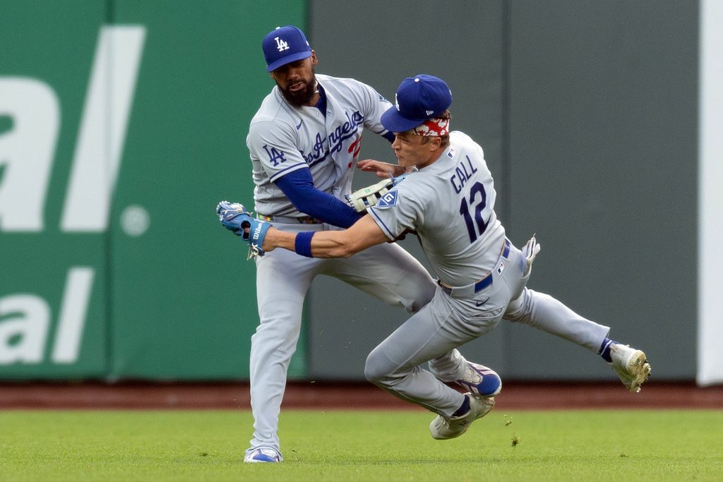 Apr 21, 2026; San Francisco, California, USA; Los Angeles Dodgers left fielder Teoscar Hernández (37) and center fielder Alex Call (12) collide pursuing a shallow popup during the first inning against the San Francisco Giants at Oracle Park. Mandatory Credit: D. Ross Cameron-Imagn Images