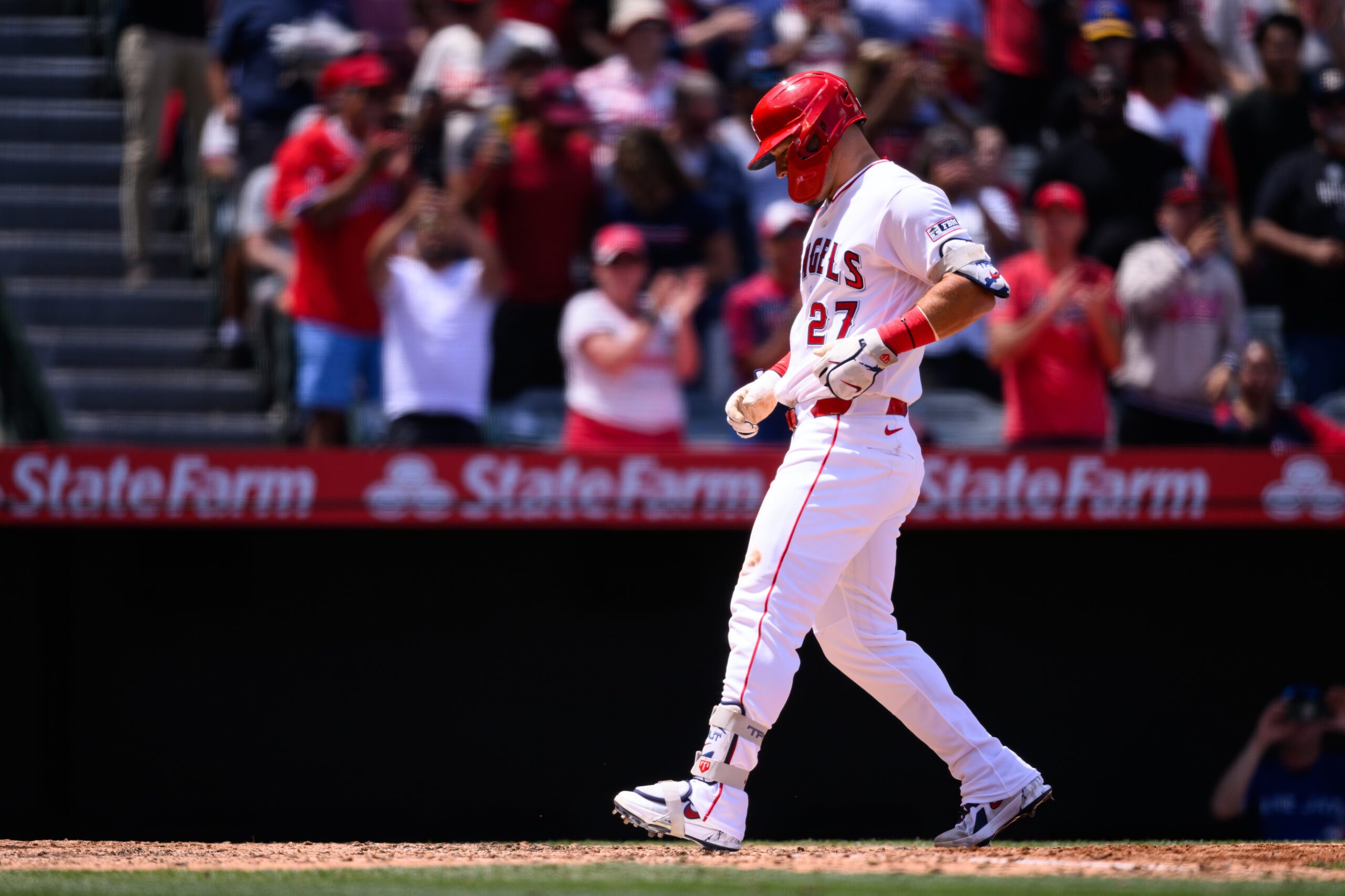 Apr 22, 2026; Anaheim, California, USA; Los Angeles Angels designated hitter Mike Trout (27) scores after hitting a home run during the fifth inning against the Toronto Blue Jays at Angel Stadium. Mandatory Credit: William Liang-Imagn Images