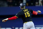 Apr 22, 2026; Arlington, Texas, USA;  Pittsburgh Pirates center fielder Oneil Cruz (15) reacts after hitting a three-run home run during the ninth inning against the Texas Rangers at Globe Life Field. Mandatory Credit: Kevin Jairaj-Imagn Images