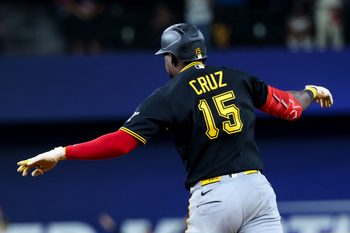 Apr 22, 2026; Arlington, Texas, USA;  Pittsburgh Pirates center fielder Oneil Cruz (15) reacts after hitting a three-run home run during the ninth inning against the Texas Rangers at Globe Life Field. Mandatory Credit: Kevin Jairaj-Imagn Images