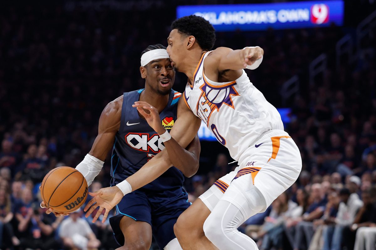 Apr 22, 2026; Oklahoma City, Oklahoma, USA; Oklahoma City Thunder guard Shai Gilgeous-Alexander (2) and Phoenix Suns forward Ryan Dunn (0) run into each other on a drive in the second half during game two of the first round of the 2026 NBA Playoffs at Paycom Center. Mandatory Credit: Alonzo Adams-Imagn Images