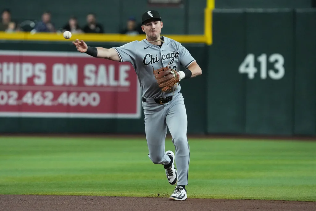 Apr 23, 2026; Phoenix, Arizona, USA; Chicago White Sox shortstop Colson Montgomery (12) makes the play for an out against the Arizona Diamondbacks in the first inning at Chase Field. Mandatory Credit: Rick Scuteri-Imagn Images