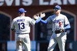 Apr 23, 2026; San Francisco, California, USA; Los Angeles Dodgers third baseman Max Muncy (13) celebrates with first baseman Freddie Freeman (5) after the game against the San Francisco Giants at Oracle Park. Mandatory Credit: Kelley L Cox-Imagn Images