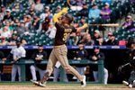 Apr 23, 2026; Denver, Colorado, USA; San Diego Padres first baseman Gavin Sheets (30) hits a three run home run in the ninth inning against the Colorado Rockies at Coors Field. Mandatory Credit: Isaiah J. Downing-Imagn Images