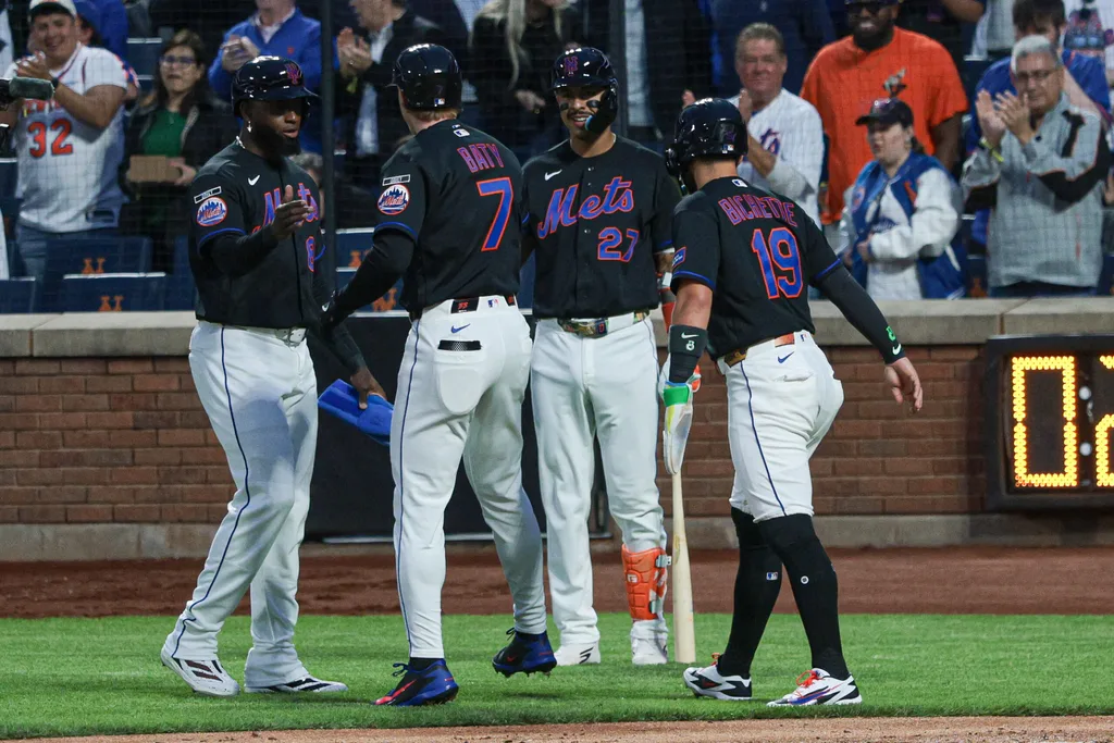 Apr 23, 2026; New York City, New York, USA; New York Mets third baseman Brett Baty (7)celebrates with teammates after hitting a three run home run during the first inning against the Minnesota Twins at Citi Field. Mandatory Credit: Vincent Carchietta-Imagn Images