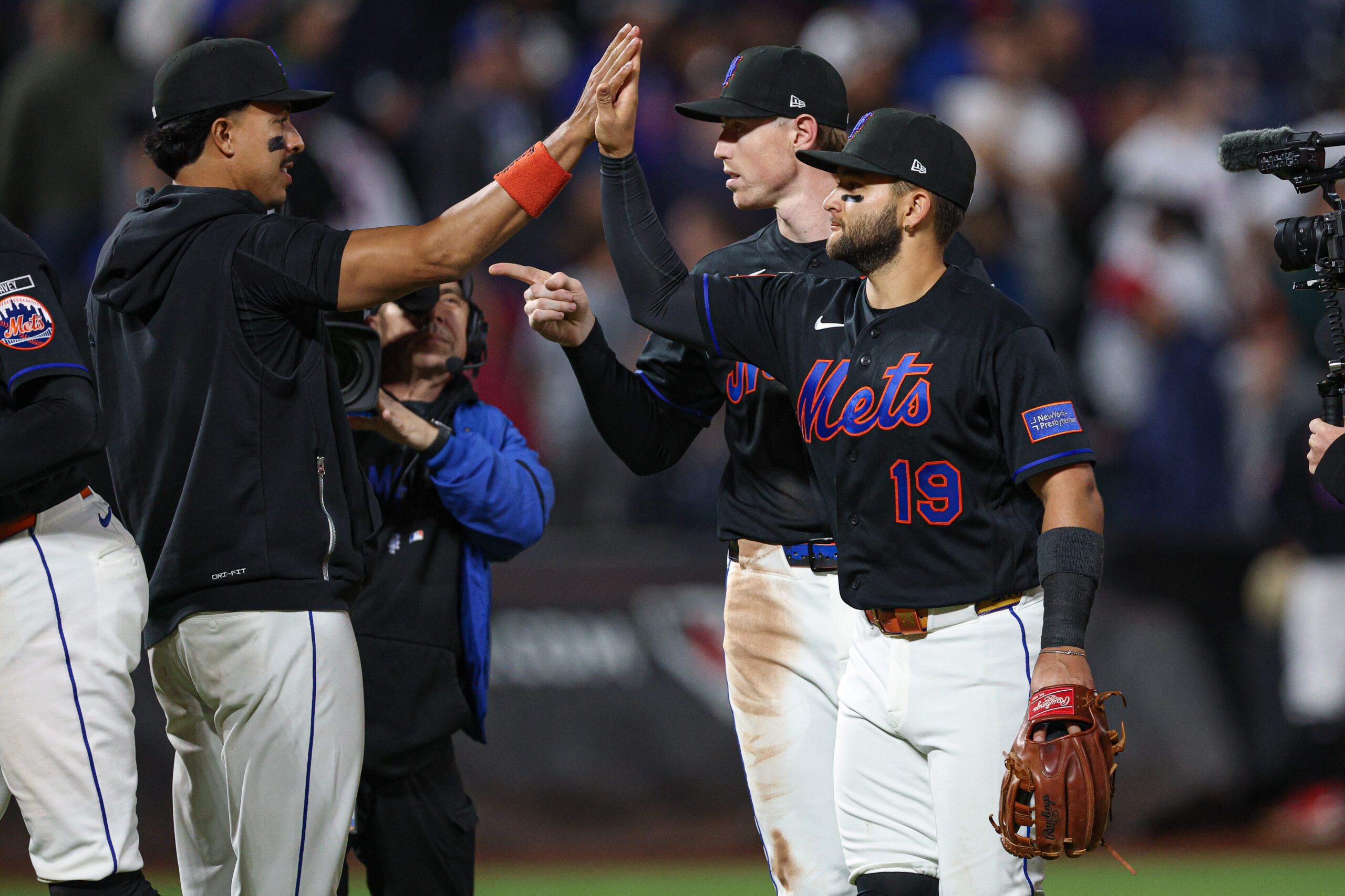 Apr 23, 2026; New York City, New York, USA; New York Mets shortstop Bo Bichette (19) celebrates with teammates after defeating the Minnesota Twins at Citi Field. Mandatory Credit: Vincent Carchietta-Imagn Images