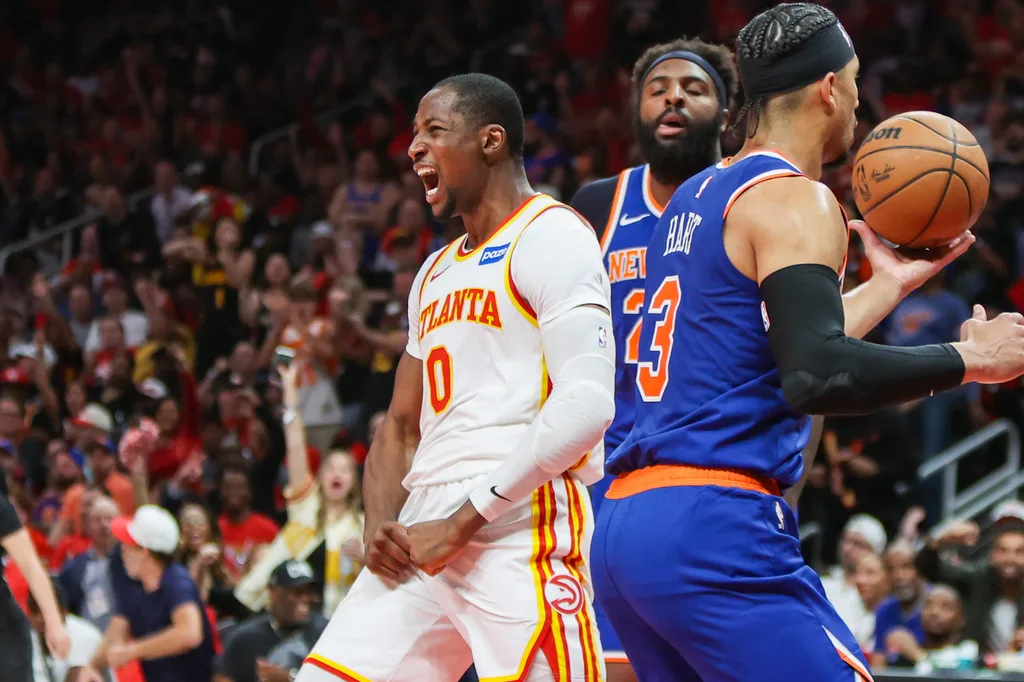 Apr 23, 2026; Atlanta, Georgia, USA; Atlanta Hawks forward Jonathan Kuminga (0) reacts after a basket against the New York Knicks in the fourth quarter during game three of the first round of the 2026 NBA Playoffs at State Farm Arena. Mandatory Credit: Brett Davis-Imagn Images