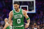 Apr 24, 2026; Philadelphia, Pennsylvania, USA; Boston Celtics forward Jayson Tatum (0) reacts after a three point basket against the Philadelphia 76ers during the second half at Xfinity Mobile Arena. Mandatory Credit: Eric Hartline-Imagn Images