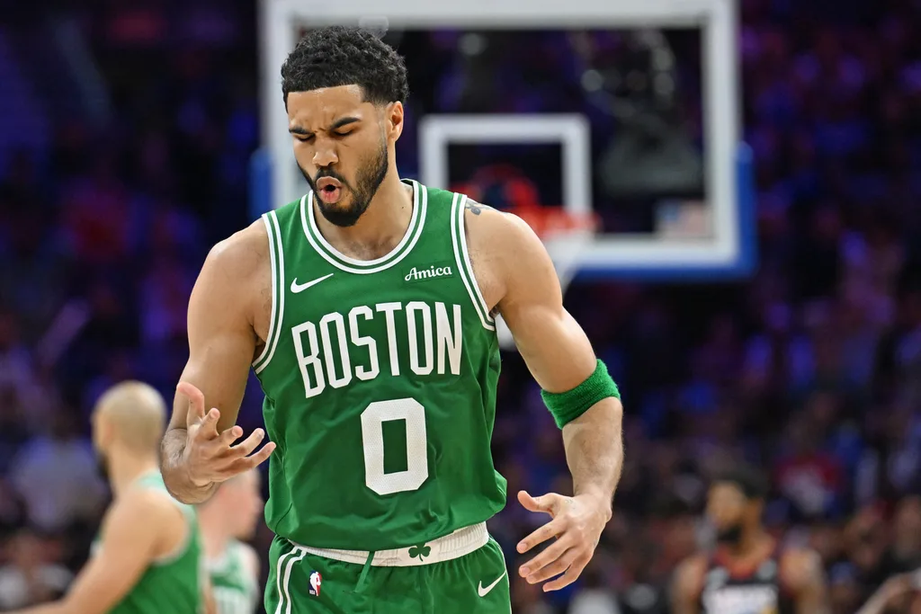 Apr 24, 2026; Philadelphia, Pennsylvania, USA; Boston Celtics forward Jayson Tatum (0) reacts after a three point basket against the Philadelphia 76ers during the second half at Xfinity Mobile Arena. Mandatory Credit: Eric Hartline-Imagn Images
