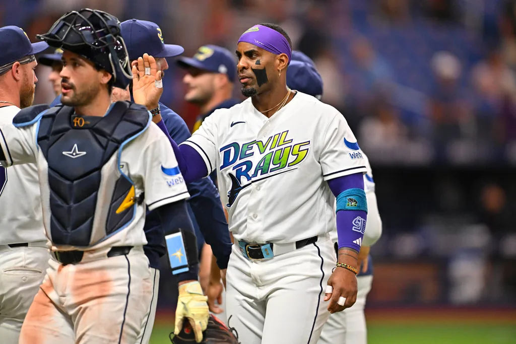 Apr 24, 2026; St. Petersburg, Florida, USA; Tampa Bay Rays infielder Yandy Diaz (2) celebrates with teammates during the ninth inning against the Minnesota Twins at Tropicana Field. Mandatory Credit: Pablo Robles-Imagn Images