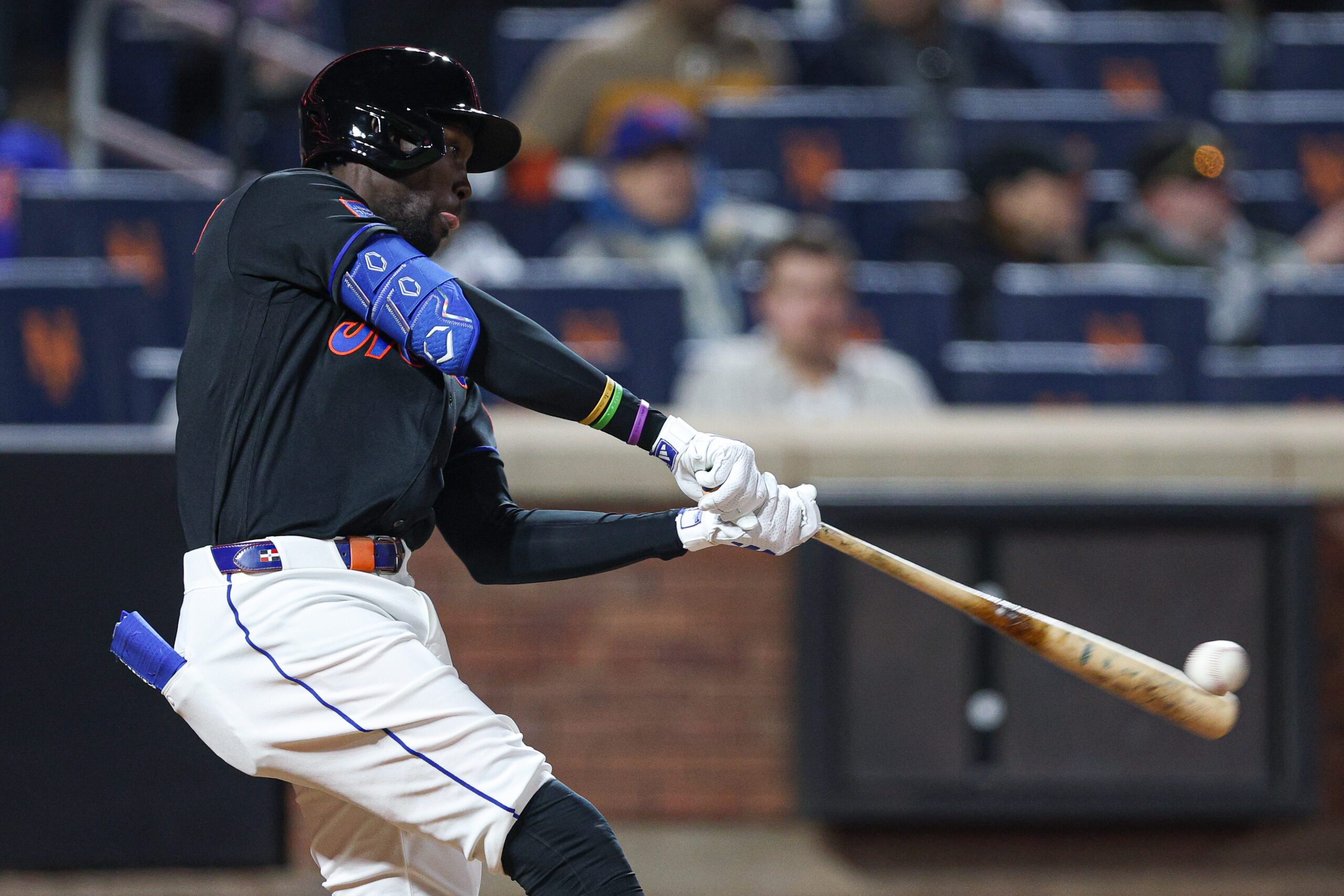 Apr 24, 2026; New York City, New York, USA;  New York Mets third baseman Ronny Mauricio (0) singles during the fifth inning against the Colorado Rockies at Citi Field. Mandatory Credit: Vincent Carchietta-Imagn Images