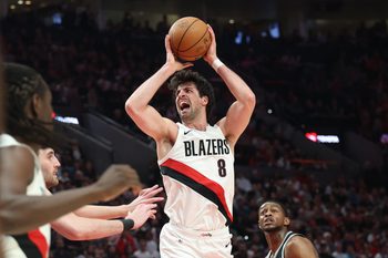 Apr 24, 2026; Portland, Oregon, USA; Portland Trail Blazers forward Deni Avdija (8) reacts after drawing a foul on San Antonio Spurs guard De'aaron Fox (4) during the first half during game three of the first round of the 2026 NBA Playoffs at Moda Center. Mandatory Credit: Jaime Valdez-Imagn Images