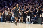Apr 25, 2026; Minneapolis, Minnesota, USA; Minnesota Timberwolves guard Ayo Dosunmu (13) celebrates with fans after making a three-point shot against the Denver Nuggets in the fourth quarter at Target Center. Mandatory Credit: Matt Blewett-Imagn Images