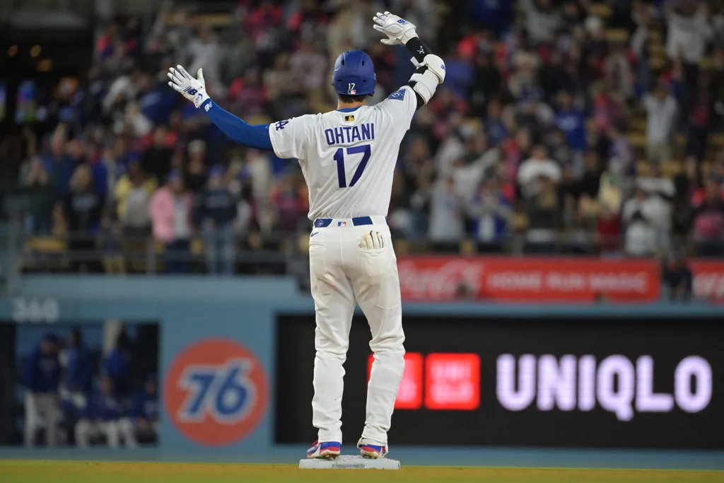 Apr 27, 2026; Los Angeles, California, USA; Los Angeles Dodgers two-way player Shohei Ohtani (17) on base after a double in the ninth inning against the Miami Marlins at Dodger Stadium. Mandatory Credit: Jayne Kamin-Oncea-Imagn Images