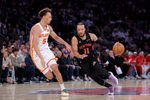Apr 28, 2026; New York, New York, USA; New York Knicks guard Jalen Brunson (11) brings the ball up court against Atlanta Hawks guard Dyson Daniels (5) during the second quarter of game five of the first round of the 2026 NBA Playoffs at Madison Square Garden. Mandatory Credit: Brad Penner-Imagn Images