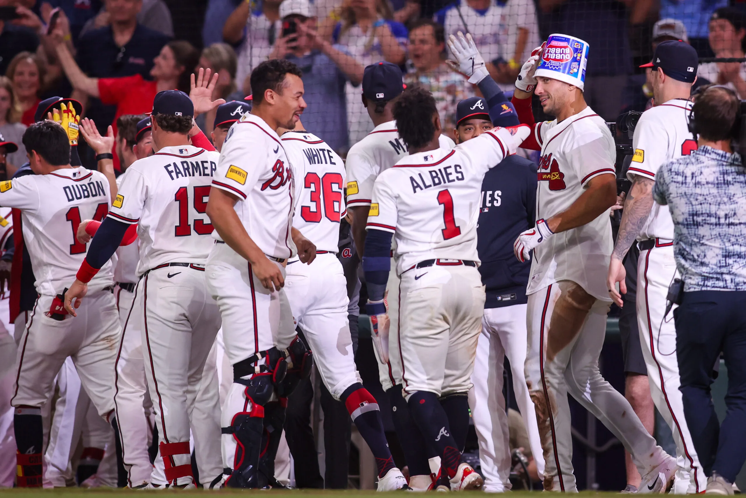 Apr 29, 2026; Atlanta, Georgia, USA; Atlanta Braves first baseman Matt Olson (28) celebrates with teammates after a walk-off two-run home run against the Detroit Tigers in the ninth inning at Truist Park. Mandatory Credit: Brett Davis-Imagn Images