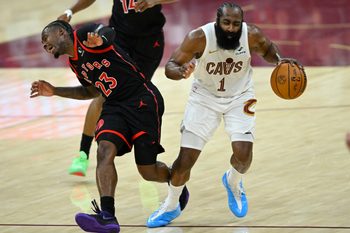 Apr 29, 2026; Cleveland, Ohio, USA; Toronto Raptors guard Jamal Shead (23) defends Cleveland Cavaliers guard James Harden (1) in the fourth quarter of game five of the first round of the 2026 NBA Playoffs at Rocket Arena. Mandatory Credit: David Richard-Imagn Images