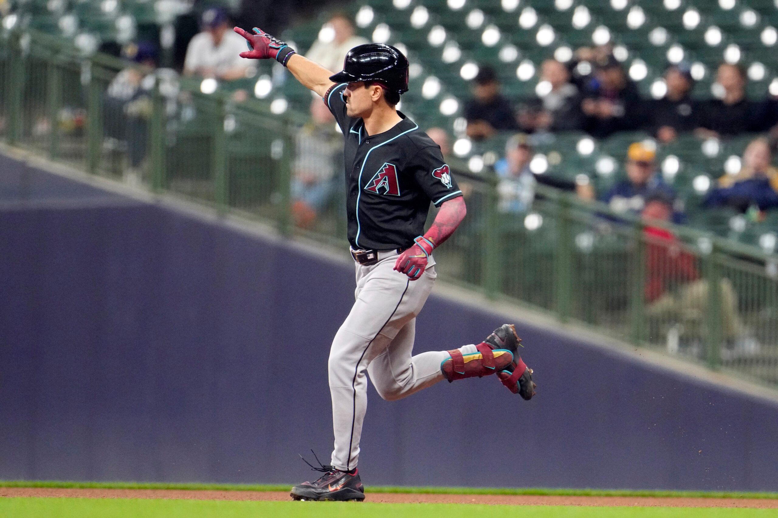 Apr 29, 2026; Milwaukee, Wisconsin, USA; Arizona Diamondbacks right fielder Corbin Carroll (7) rounds the bases after hitting a home run against the Milwaukee Brewers in the ninth inning at American Family Field. Mandatory Credit: Michael McLoone-Imagn Images