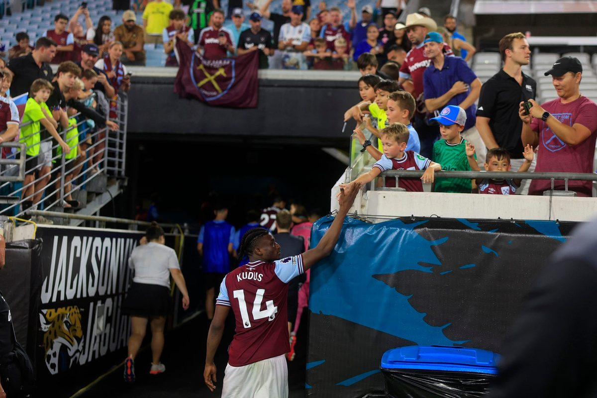 West Ham United midfielder Mohammed Kudus (14) high-fives a fan after the game of The Stateside Cup soccer tournament game Saturday, July 27, 2024 at EverBank Stadium in Jacksonville, Fla. The Wolverhampton Wanderers defeated West Ham United 3-1 in exhibition play.