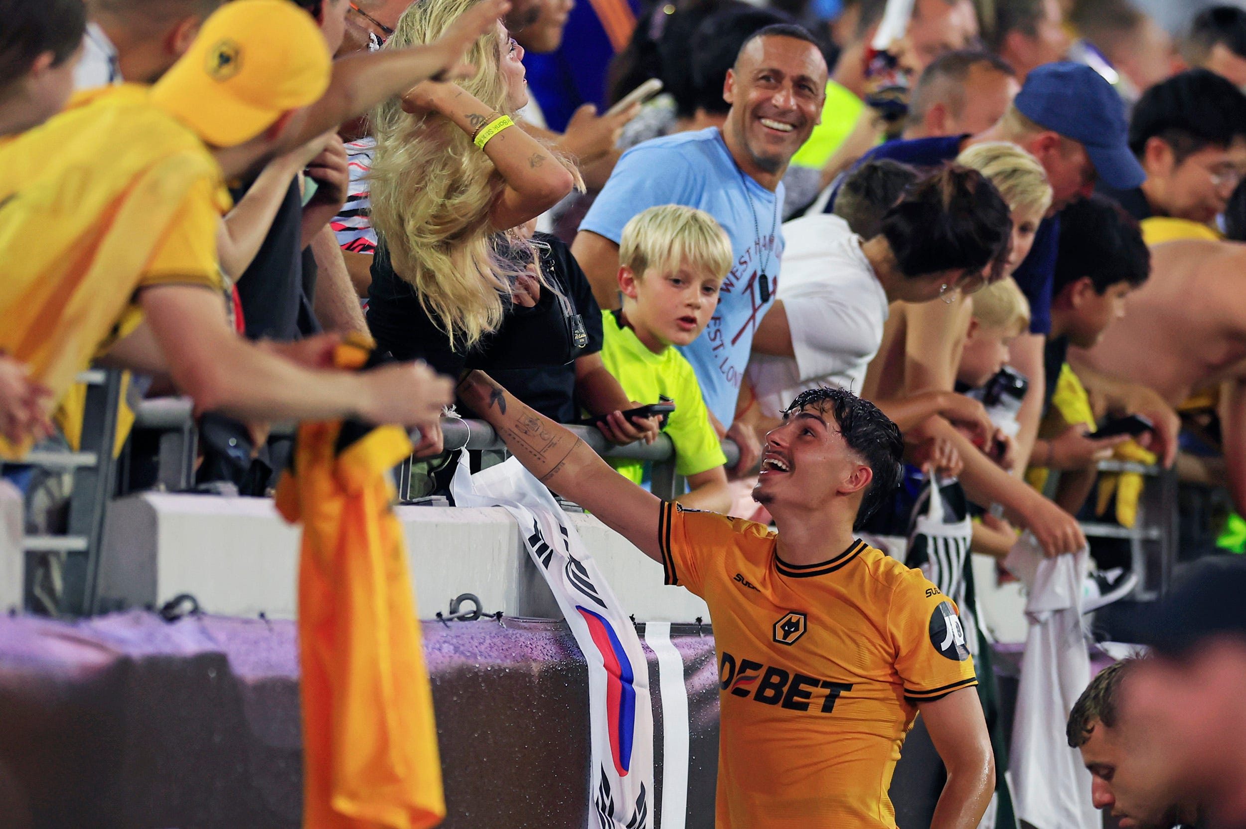 Wolverhampton Wanderers forward Rodrigo Gomes (19) greets fans after the game of The Stateside Cup soccer tournament game Saturday, July 27, 2024 at EverBank Stadium in Jacksonville, Fla. The Wolverhampton Wanderers defeated West Ham United 3-1 in exhibition play.