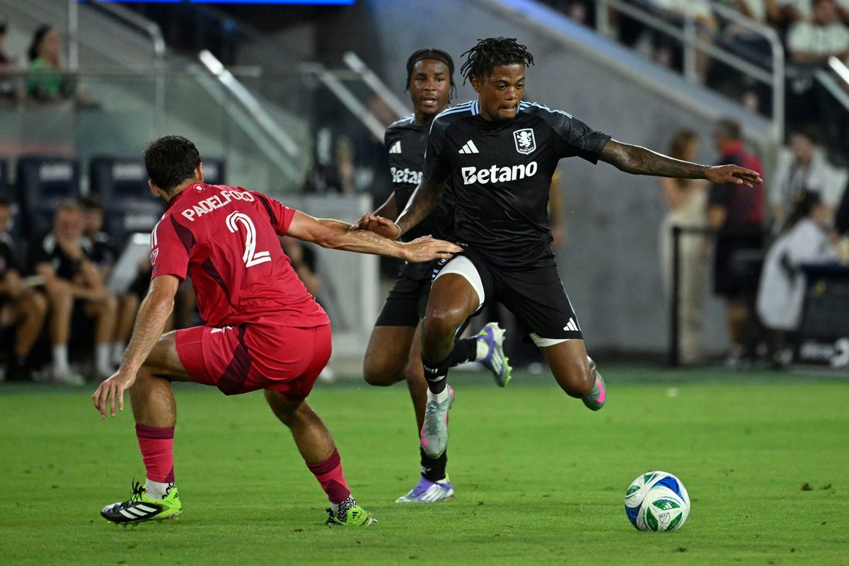 Jul 30, 2025; St. Louis, Missouri, USA; St. Louis City defender Devin Padelford (2) defends against Aston Villa midfielder Leon Bailey (31) in the first half at Energizer Park. Mandatory Credit: Joe Puetz-Imagn Images
