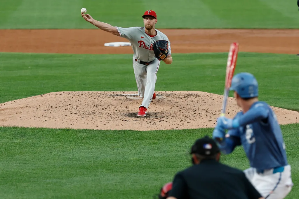 Aug 15, 2025; Washington, District of Columbia, USA; Philadelphia Phillies starting pitcher Zack Wheeler (45) pitches against Washington Nationals outfielder Robert Hassell III (57) during the second inning at Nationals Park. Mandatory Credit: Geoff Burke-Imagn Images