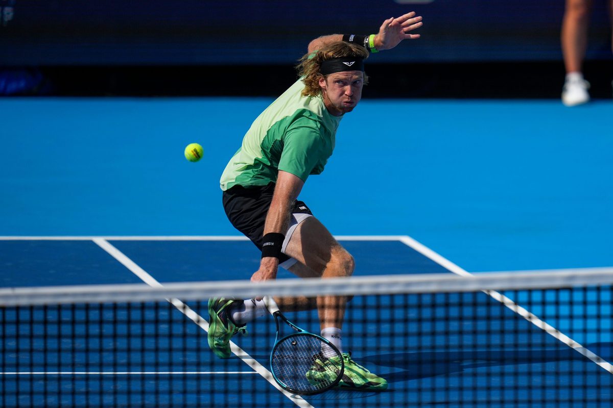 Andrey Rublev returns a shot in the Cincinnati Open quarterfinal match between Andrey Rublev and Carlos Alcaraz at the Lindner Family Tennis Center in Mason, Ohio, on Friday, Aug. 15, 2025. Alcaraz won, 6-3, 4-6, 7-5.