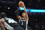 Jan 17, 2026; San Antonio, Texas, USA; San Antonio Spurs forward Victor Wembanyama (1) shoots a free throw in the second half against the Minnesota Timberwolves at Frost Bank Center. Mandatory Credit: Daniel Dunn-Imagn Images
