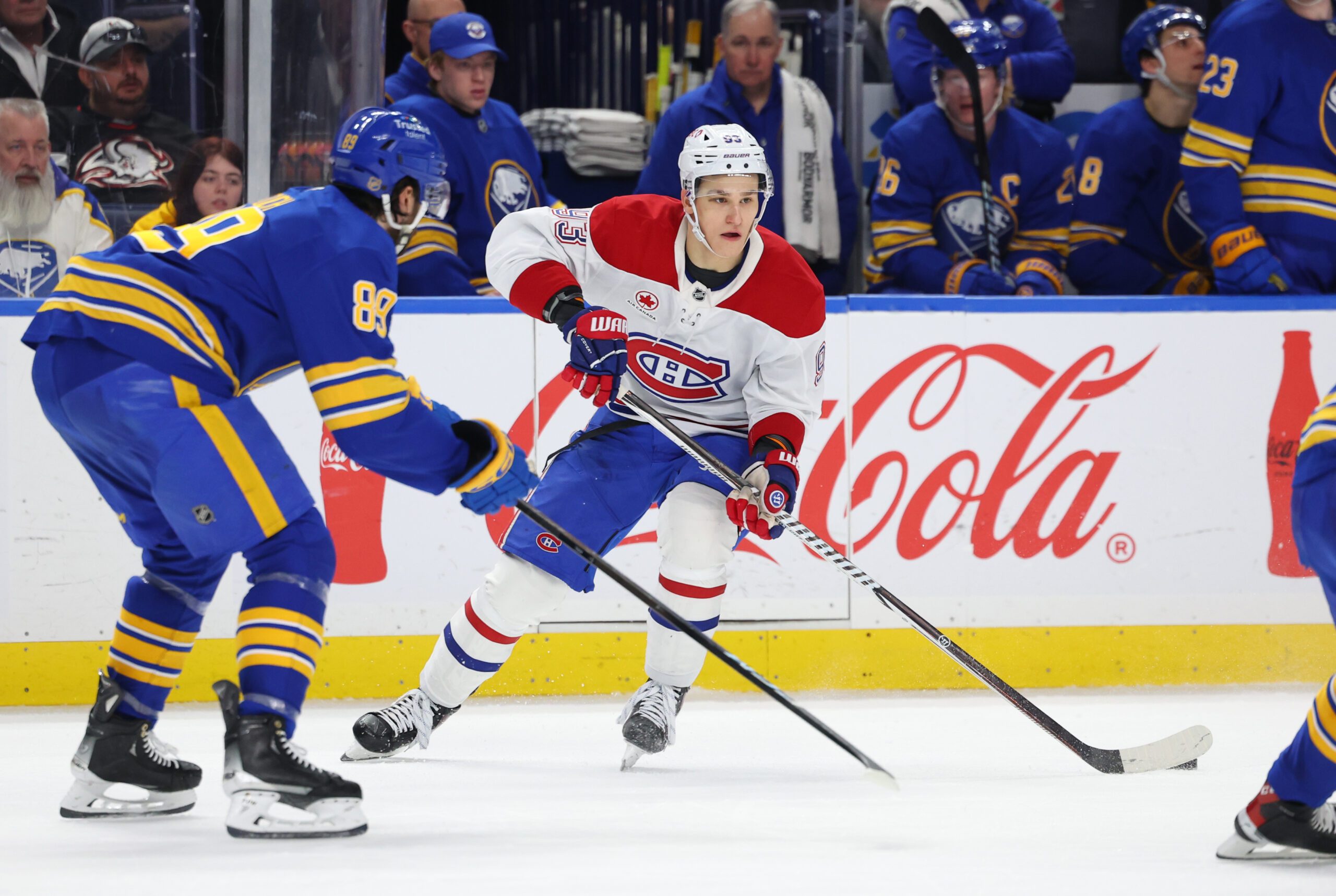 Jan 31, 2026; Buffalo, New York, USA;  Montréal Canadiens right wing Ivan Demidov (93) looks to make a pass as Buffalo Sabres right wing Alex Tuch (89) defends during the third period at KeyBank Center. Mandatory Credit: Timothy T. Ludwig-Imagn Images