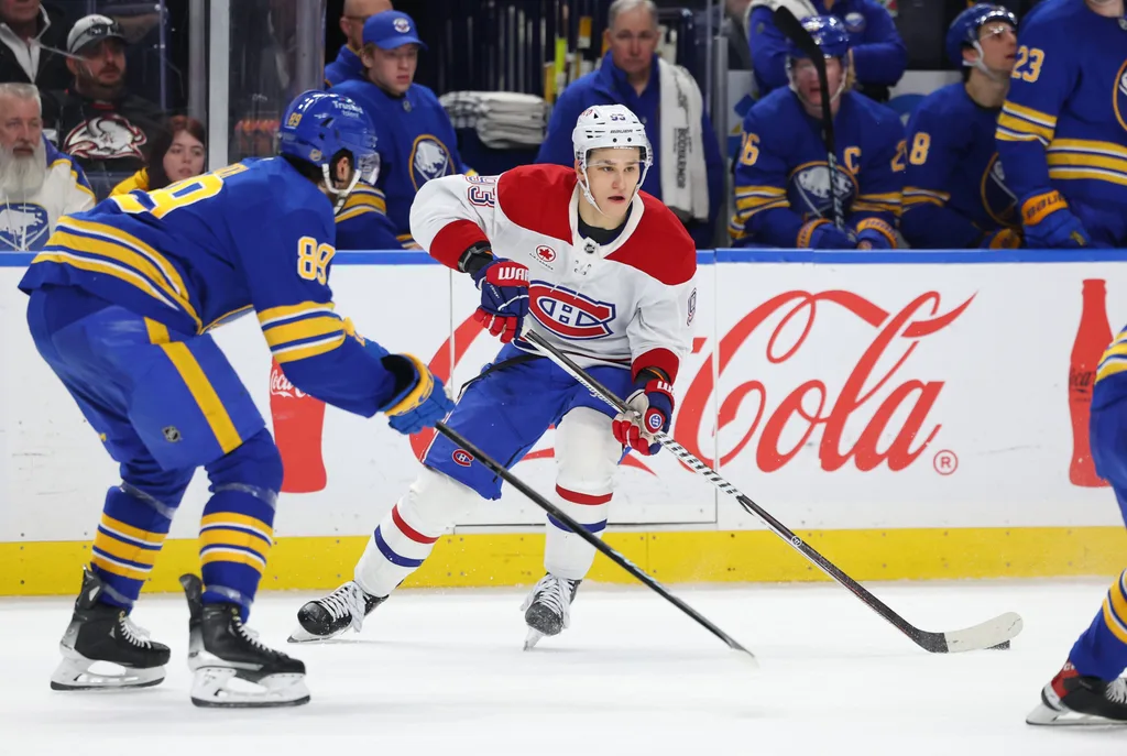 Jan 31, 2026; Buffalo, New York, USA; Montréal Canadiens right wing Ivan Demidov (93) looks to make a pass as Buffalo Sabres right wing Alex Tuch (89) defends during the third period at KeyBank Center. Mandatory Credit: Timothy T. Ludwig-Imagn Images