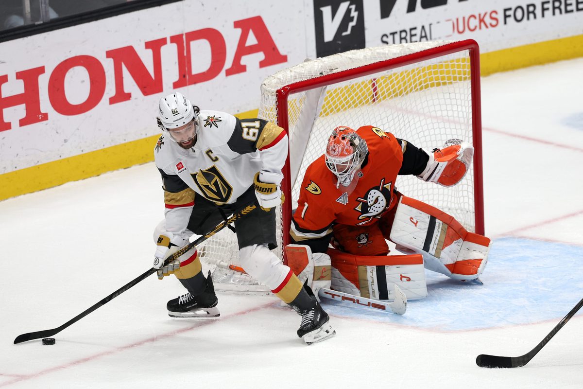 Feb 1, 2026; Anaheim, California, USA;  Vegas Golden Knights right wing Mark Stone (61) controls the puck against Anaheim Ducks goaltender Lukas Dostal (1) during the third period at Honda Center. Mandatory Credit: Kiyoshi Mio-Imagn Images