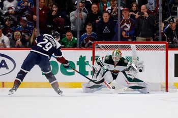 Mar 8, 2026; Denver, Colorado, USA; Colorado Avalanche center Nathan MacKinnon (29) scores a shootout goal against Minnesota Wild goaltender Jesper Wallstedt (30) at Ball Arena. Mandatory Credit: Isaiah J. Downing-Imagn Images