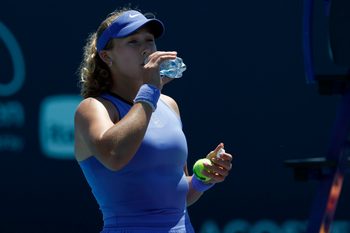 Mar 23, 2026; Miami Gardens, FL, USA; Mirra Andreeva takes a drink of water during a changeover against Victoria Mboko (CAN) (not pictured) on day 7 of the 2026 Miami Open at Hard Rock Stadium. Mandatory Credit: Geoff Burke-Imagn Images