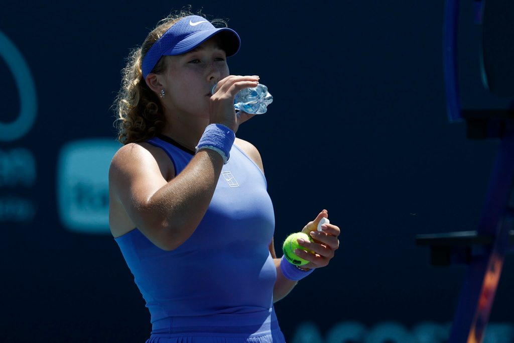 Mar 23, 2026; Miami Gardens, FL, USA; Mirra Andreeva takes a drink of water during a changeover against Victoria Mboko (CAN) (not pictured) on day 7 of the 2026 Miami Open at Hard Rock Stadium. Mandatory Credit: Geoff Burke-Imagn Images