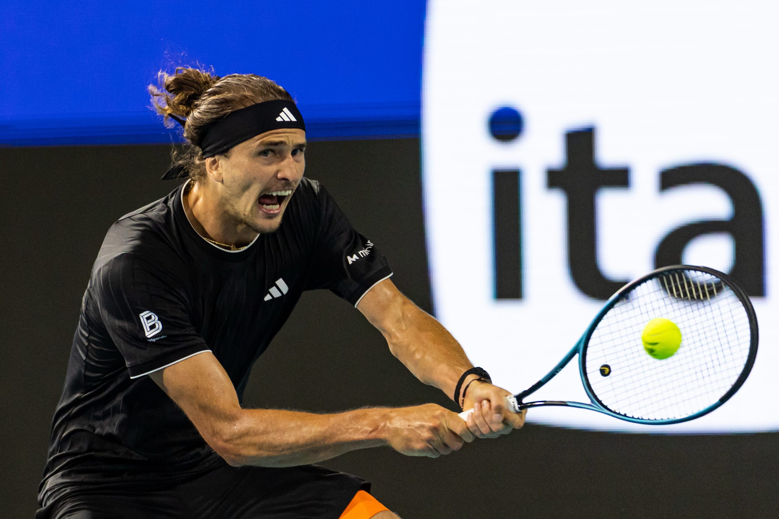 Mar 27, 2026; Miami Gardens, FL, USA;   Alexander Zverev of Germany hits a backhand against Jannik Sinner of Italy in the semi-finals of the men’s singles at the Miami Open at the Hard Rock Stadium. Mandatory Credit: Mike Frey-Imagn Images