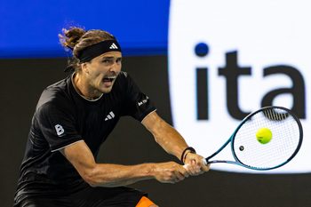 Mar 27, 2026; Miami Gardens, FL, USA;   Alexander Zverev of Germany hits a backhand against Jannik Sinner of Italy in the semi-finals of the men’s singles at the Miami Open at the Hard Rock Stadium. Mandatory Credit: Mike Frey-Imagn Images