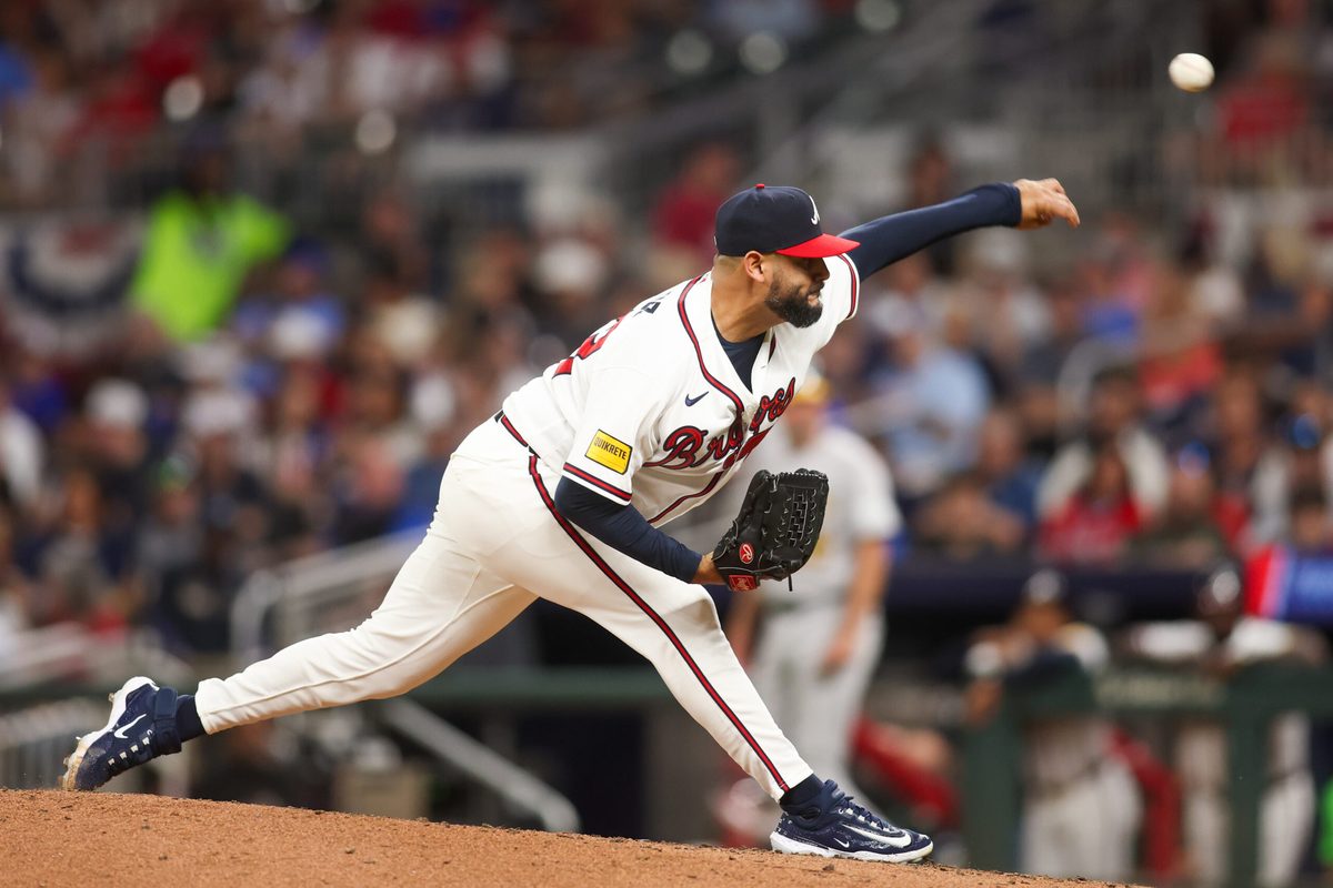 Mar 31, 2026; Atlanta, Georgia, USA; Atlanta Braves relief pitcher Martin Perez (33) throws against the Athletics in the sixth inning at Truist Park. Mandatory Credit: Brett Davis-Imagn Images