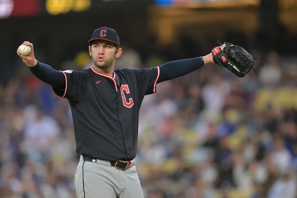 Apr 1, 2026; Los Angeles, California, USA; Cleveland Guardians pitcher Gavin Williams (32) gets set on the mound in the seventh inning against the Los Angeles Dodgers at Dodger Stadium. Mandatory Credit: Jayne Kamin-Oncea-Imagn Images