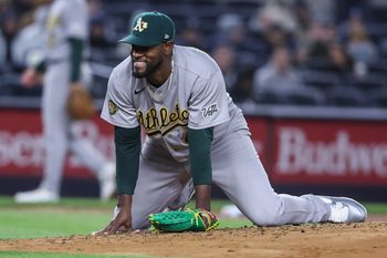 Apr 8, 2026; Bronx, New York, USA; Athletics starting pitcher Luis Severino (40) reacts after almost getting hit by the ball in the third inning against the New York Yankees at Yankee Stadium. Mandatory Credit: Wendell Cruz-Imagn Images