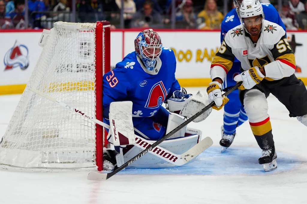 Apr 11, 2026; Denver, Colorado, USA; Vegas Golden Knights right wing Keegan Kolesar (55) and Colorado Avalanche goaltender MacKenzie Blackwood (39) during the third period at Ball Arena. Mandatory Credit: Ron Chenoy-Imagn Images