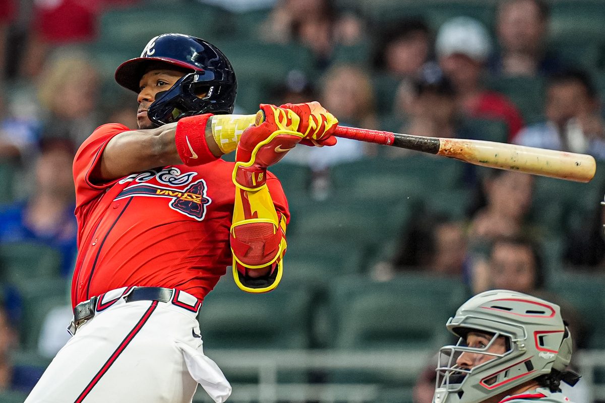 Apr 24, 2026; Cumberland, Georgia, USA; Atlanta Braves right fielder Ronald Acuna Jr. (13) hits a home run against the Philadelphia Phillies during the third inning at Truist Park. Mandatory Credit: Dale Zanine-Imagn Images